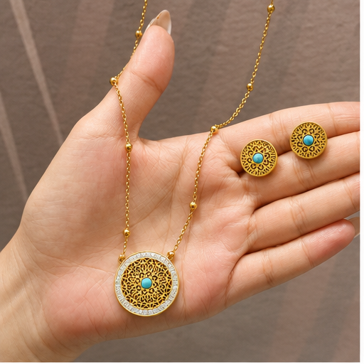 A Gold Tone Turquoise Center Stones Pendant Set