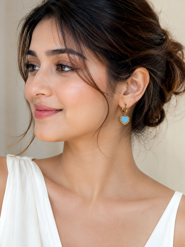 A Pair of Gold Hoop Sky Blue Heart-Shaped Earrings