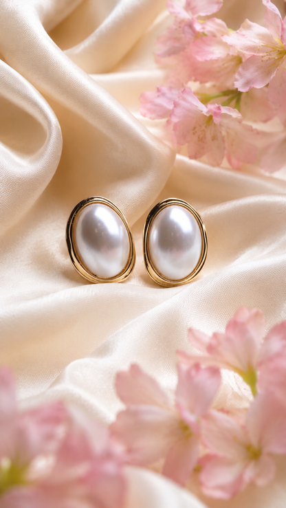 A Gold-Toned Hoop  With White Pearl Earrings