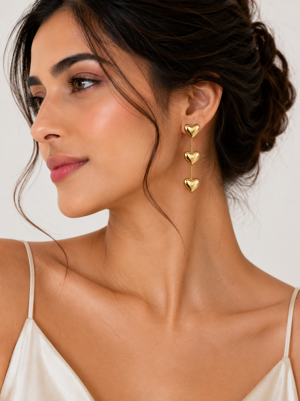 A Golden Triple Heart Drop Earrings
